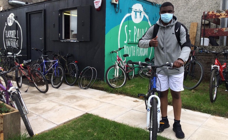 Young person outside the On Bikes site