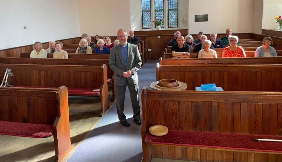 Rev Stewart Goudie  at his final service at Arisaig Church