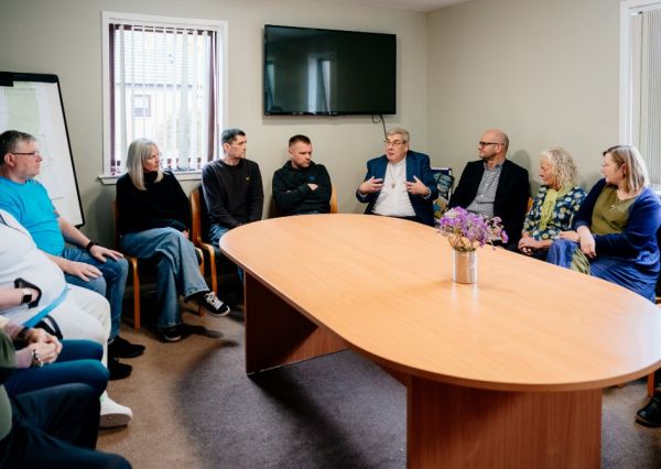 Dr Paterson with Beechwood House residents and staff.