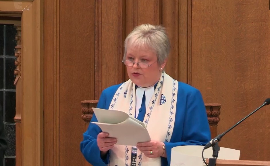 Rev Fiona Smith reading the letter