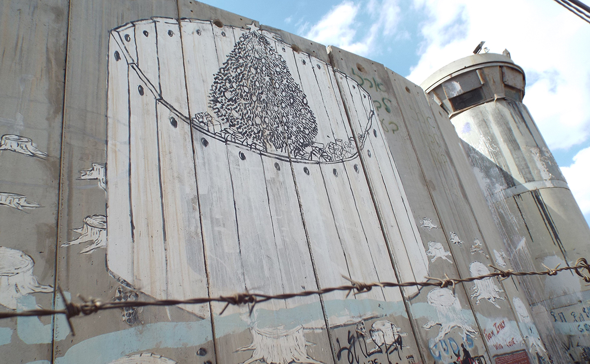 A Christmas tree painted on Separation Wall in Bethlehem