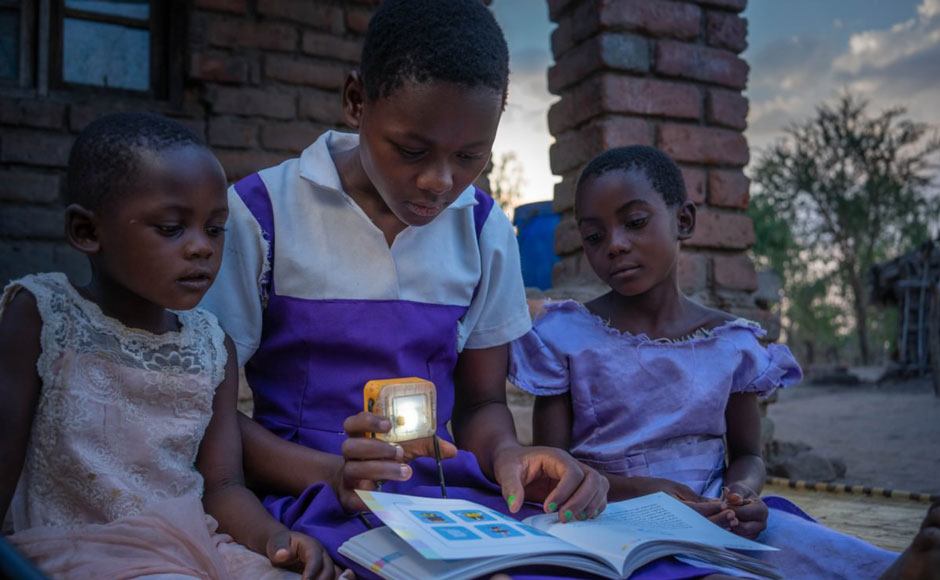 Kid using the solar light