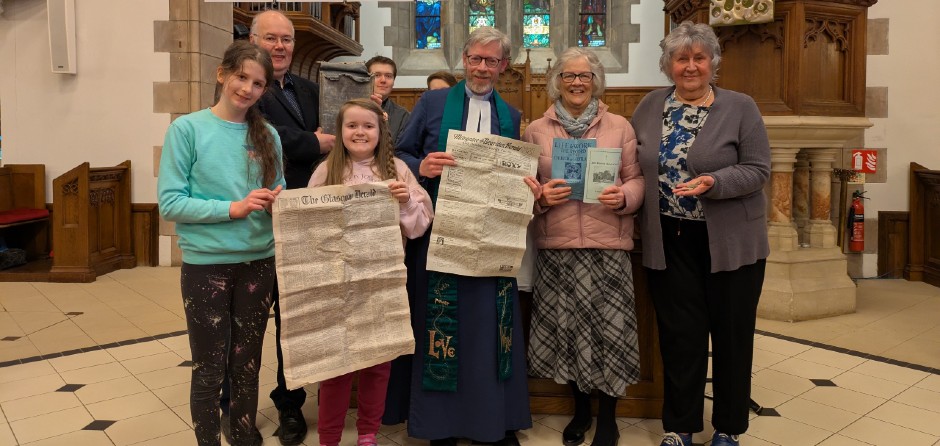 Members of New Kilpatrick Parish Church will the contents of the time capsule.