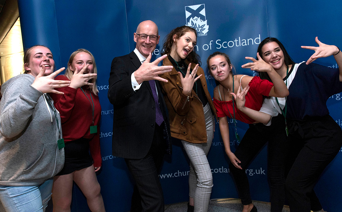 John Swinney MSP with young people at a parliamentary reception