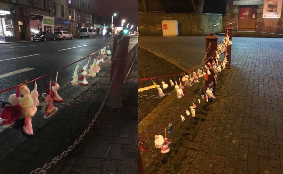 Knitted angels outside in the street