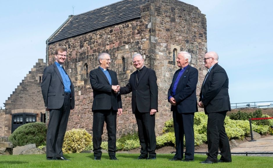 Ecumenical group from both the Church of Scotland and the Catholic Church pictured at St Margaret's Chapel, Edinburgh.