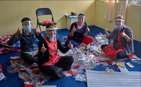 Nurse tutors in Nepal making protective visors