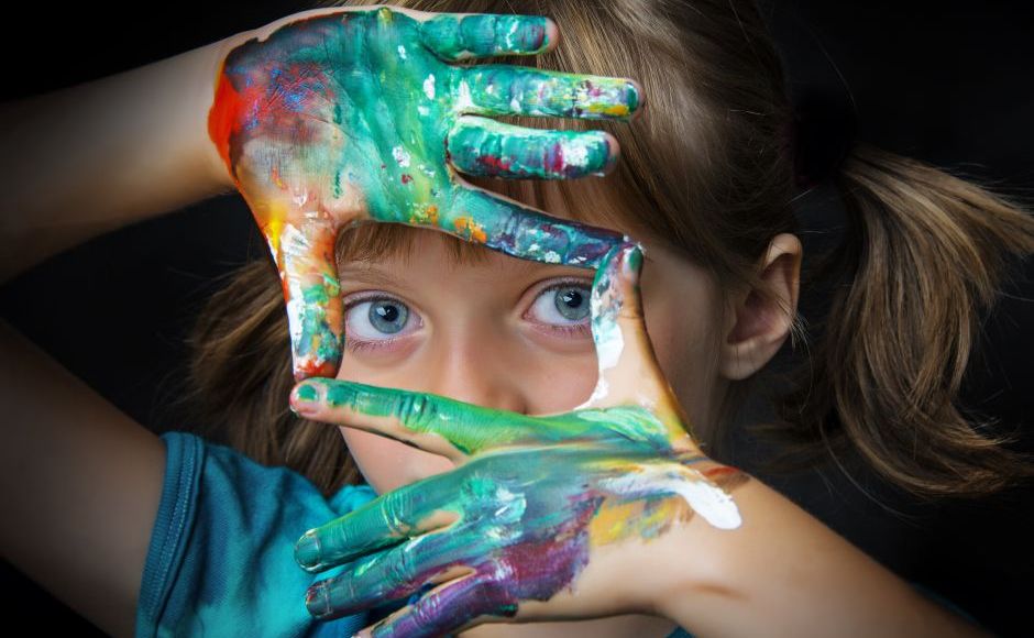 Girl with painted hands