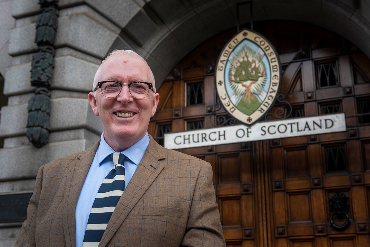 Martin Fair in front of the Church of Scotland's offices