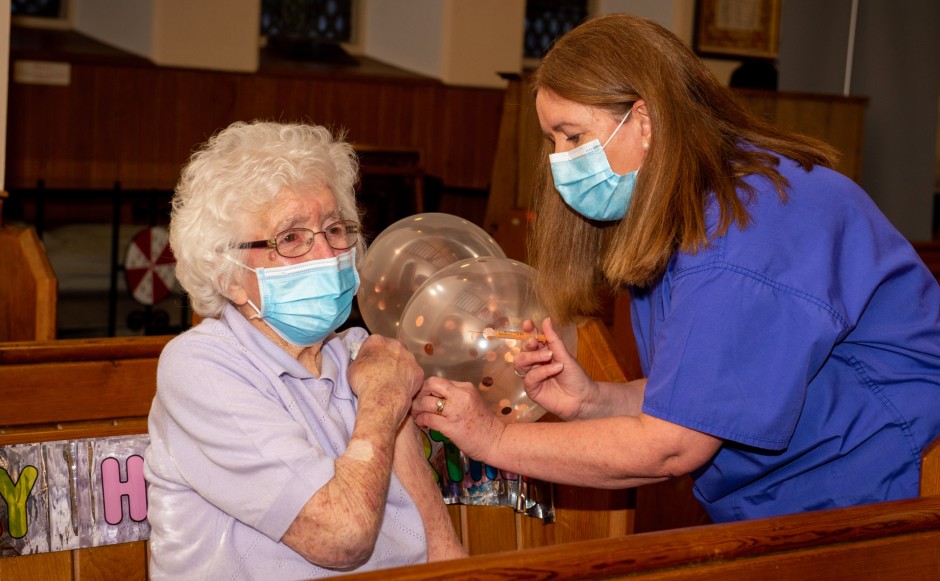 Mrs Dawson receiving her vaccine on her 108th birthday at Houston and Killelan Kirk