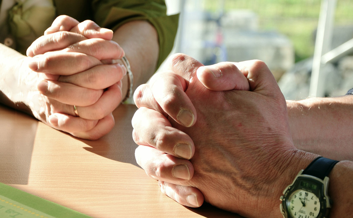 Hands praying