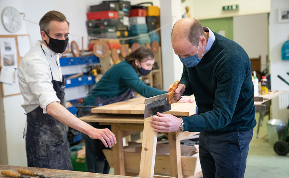 Prince William visiting the Grassmarket Community Project's workshop which makes furniture from recycled pews and other responsibly-resourced wood
